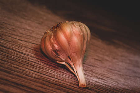 garlic on a wooden backgroundの写真素材