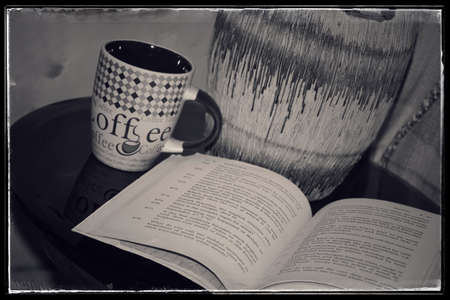 a book and a cupの写真素材