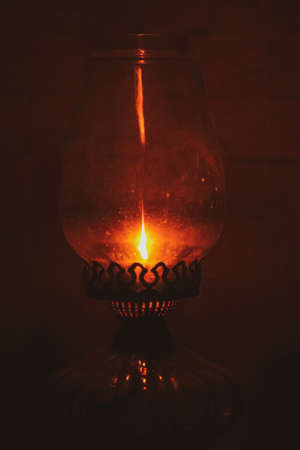 burning candle in a glass jarの写真素材