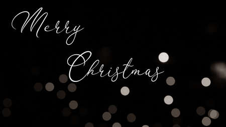 Merry Christmas wish greeting poster banner card on black backgroundの写真素材