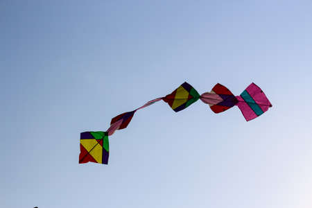 colourful kites flying in the skyの写真素材