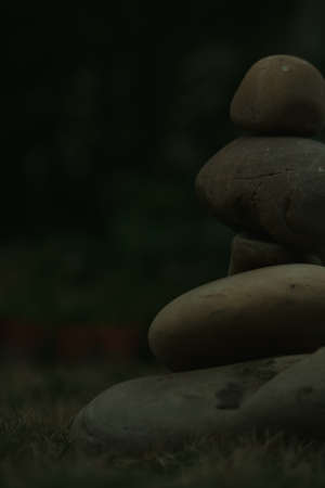 closeup of the balance of the stone on the groundの写真素材