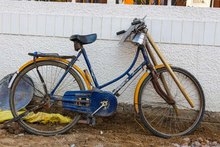 An old bicycle on the street in the frameの写真素材