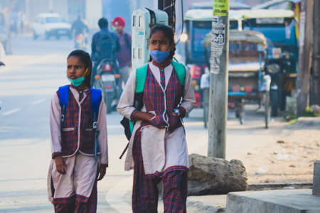 Kids going to school during corona crisis by wearing masksのeditorial素材