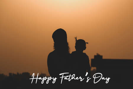 Illustration of Happy father's day with silhouette of father carrying childの写真素材