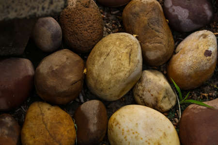 abstract background backdrop, of textured stones and pebblesの写真素材
