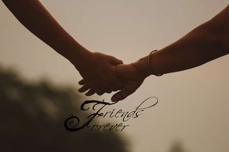 Illustration of Happy friendship day friends forever with a handshake between two peopleの写真素材