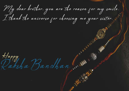Illustration of Happy Raksha Bandhan card greetings wish message with rakhi threadsの写真素材