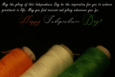 Illustration of Happy independence day in tricolour with Indian flag threads at the bottomの写真素材