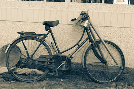 old bicycle on the street with the tiffin and instruments traitional daily wage worker's cycleの写真素材
