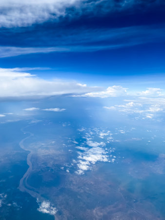 blue sky and sea view from the airplane windowの写真素材