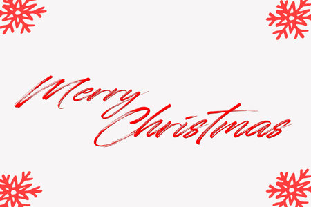 red merry christmas on white background with snowflakesの写真素材