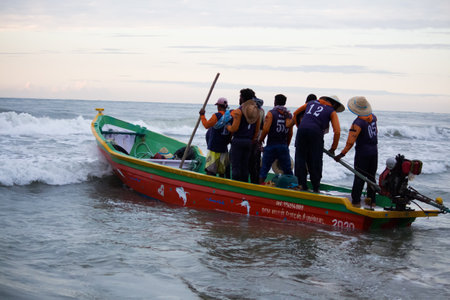 Unidentified Thai people are waiting for the boat to enter the sea in Nakhon Ratchasima, Thailand.の写真素材