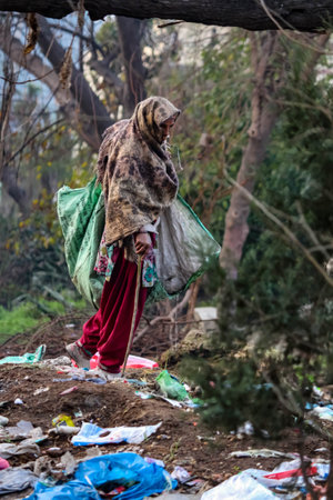 Hoshiarpur Punjab India 02 04 2021 A ragpicker (old woman) on the streetのeditorial素材