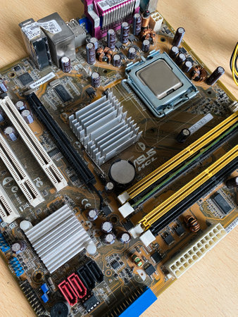 Computer motherboard close-up. Electronic device. Motherboard digital chip macro shot.の写真素材