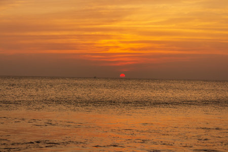 Beautiful dramatic paradise Sunset on the beach at Kanyakumari Tamil Naidu India. Sunset landscape seascapeの写真素材