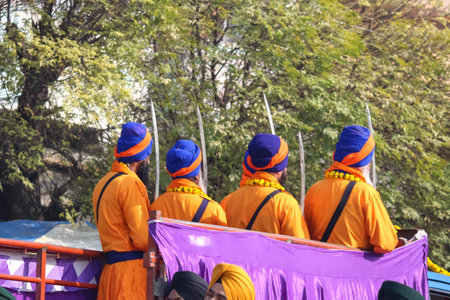 Unidentified devotees take part in a religious procession during the Holi festival in Kolkata, West Bengal, India.の写真素材