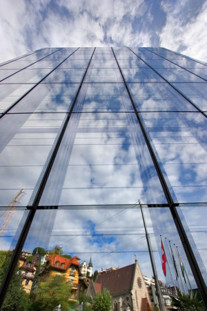  A mirror wall of a skyscraper in resort city Montreux in Switzerland