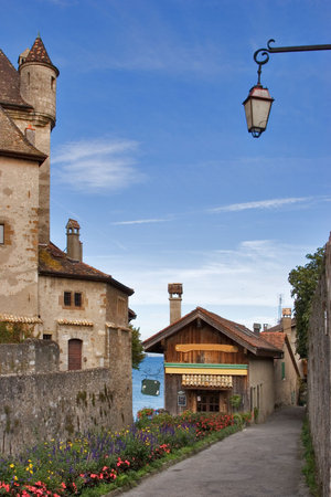 Small medieval  town on coast of lake Leman in Switzerlandの写真素材