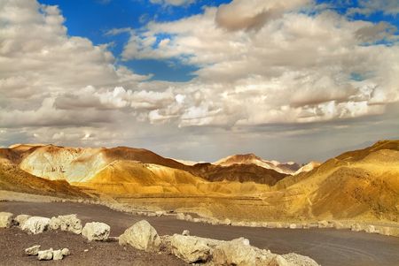  The sun and clouds above mountains of desert Sinaiの写真素材