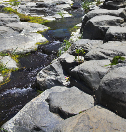 Granite channel of a drying up mountain stream in mountains of Israel の写真素材