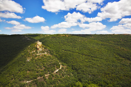 Ruins of an ancient fort of crusaders in mountains of Israel
