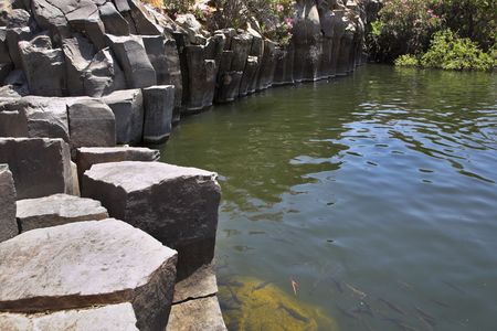 Drying up stream between picturesque stone polyhedrons in mountains of Israelの写真素材