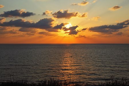 Sparkling sunset in the summer above Mediterranean seaの写真素材