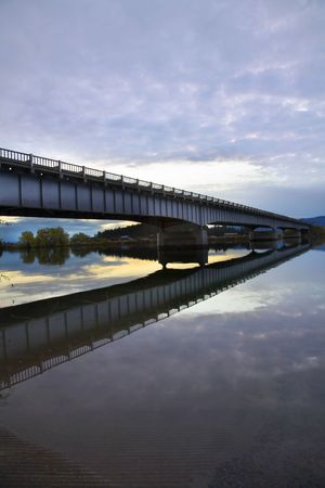The metal bridge in light twilight of rainy dayの写真素材