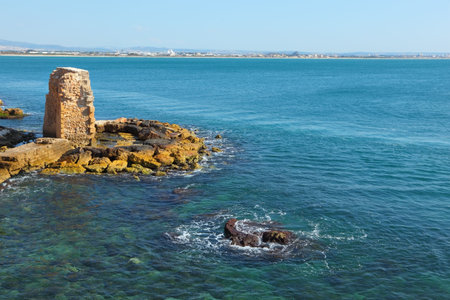 Ruins of a protective fortification. Mediterranean sea, the ancient city of Akko, spring dayの写真素材