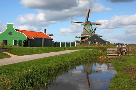 A charming old windmill in the Dutch village museumの写真素材