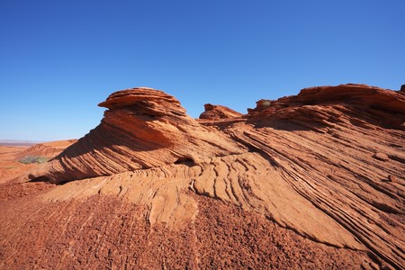 Quaint and picturesque forms cliffs of red sandstone. Walk around the famous Horseshoe Canyonの写真素材