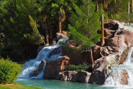 Oasis in desert. Magnificent cascade falls in the tourist centreの写真素材