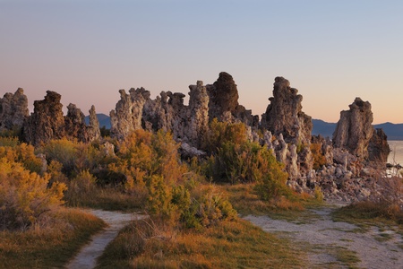 Magically beautiful sunrise. Sunrise at Mono Lake in the crater of an ancient extinct volcano. Shallow lake, a multitude of picturesque reefs Tufaの写真素材