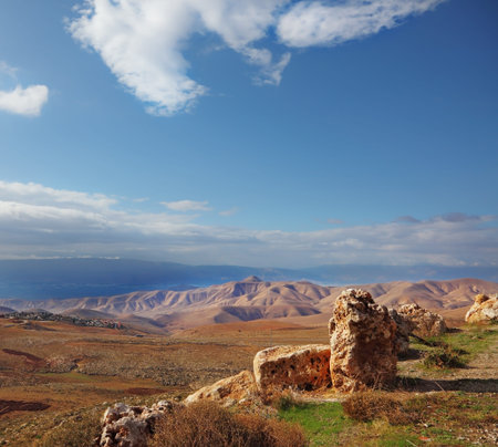 Magnificent transparent day in Judean desert. Huge boulders along highway, an unflawed skyの写真素材
