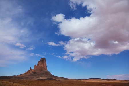 Monument Valley in the Navajo reservation in the USA. Rock of red sandstone in the Sunlightの写真素材