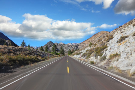 We're going at high speed through a picturesque  mountains.