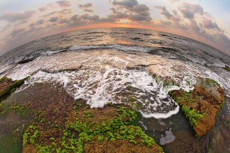 The Mediterranean Sea at low tide, photographed lens Fisheye  Sunsetの写真素材