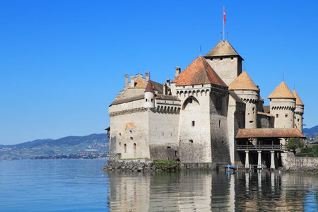 The world-famous Castle of Chillon on Lake Geneva. A beautiful sunny day in Switzerlandのeditorial素材