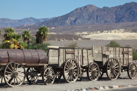 The open air museum. Antique cars and carts of the first settlers in the Death Valley の写真素材