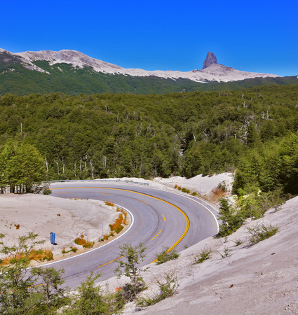 Winding road in Chilean Patagonia, covered remnants of volcanic dustの写真素材