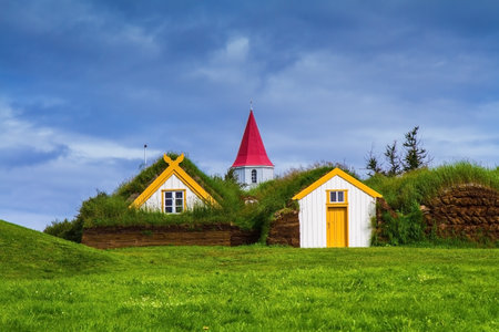 The village of ancestors in Iceland. The recreated village -  museum of pioneers - Vikings. Houses are roofed by the turfのeditorial素材