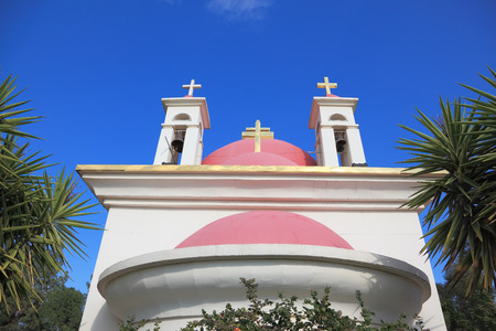 The white walls and pink domes Orthodox Church of the Twelve Apostles on the shore of Lake Kinneret.の写真素材
