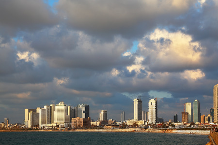 Magnificent panorama of the waterfront promenade in Tel Aviv. Sunset on a windy and cloudy day in Mayの写真素材