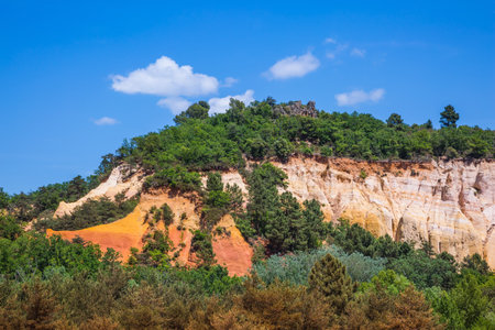 Languedoc - Roussillon, Provence, France. Reserve in mining ocher quarry. Orange and red picturesque...