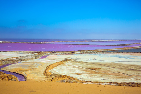 Extraction of ocean salt in Namibia. Multicolored fields for evaporation of water in Walvis Bay. The concept of ecological and exotic tourismの写真素材