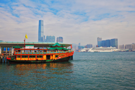 HONG KONG, DECEMBER 11, 2014: Hong Kong Special Administrative Region. The modern city on the ocean coast. Skyscrapers and floating restaurantのeditorial素材