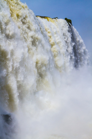 Water splashes and fog over Iguazu Falls on the border of Brazil, Argentina and Paraguay. Concept of active and extreme tourismの写真素材