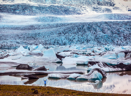  The grand spectacle - sunset over the  Iceland's largest glacier Vatnajokull. The concept of...