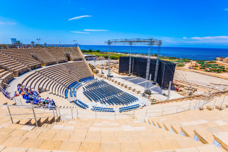  Concept of archeological and historical tourism. The oldest Roman amphitheater in Israel, built at Tsar Herod. The scene is currently equippedの写真素材
